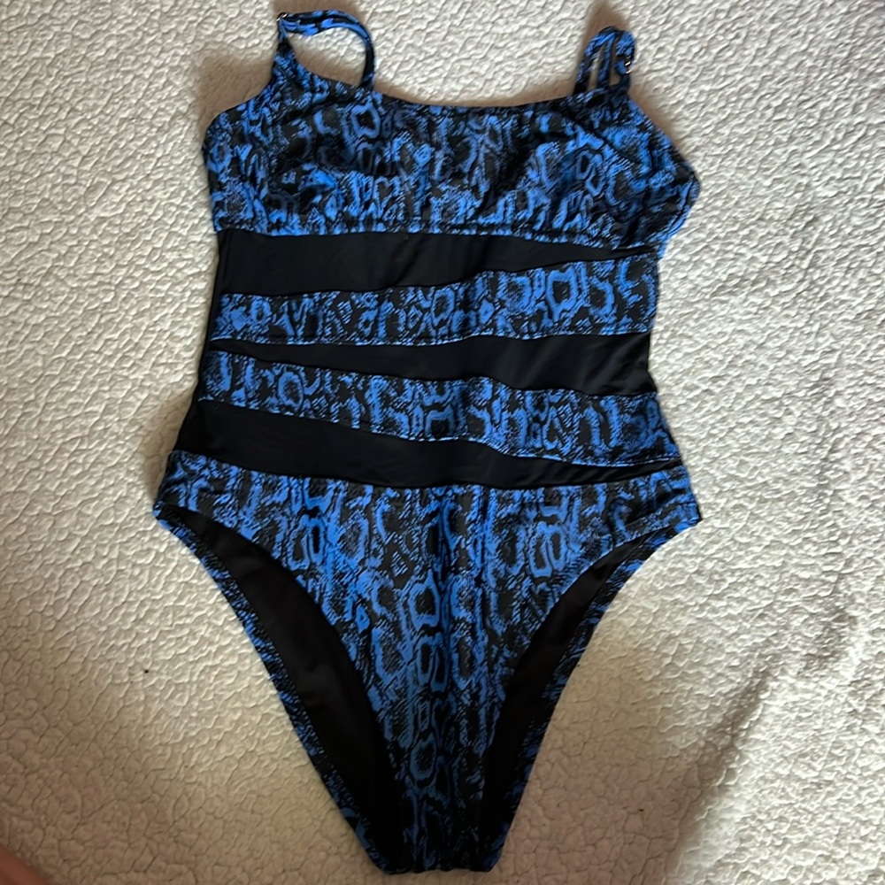One piece swimsuit, has been used, no wear or tear